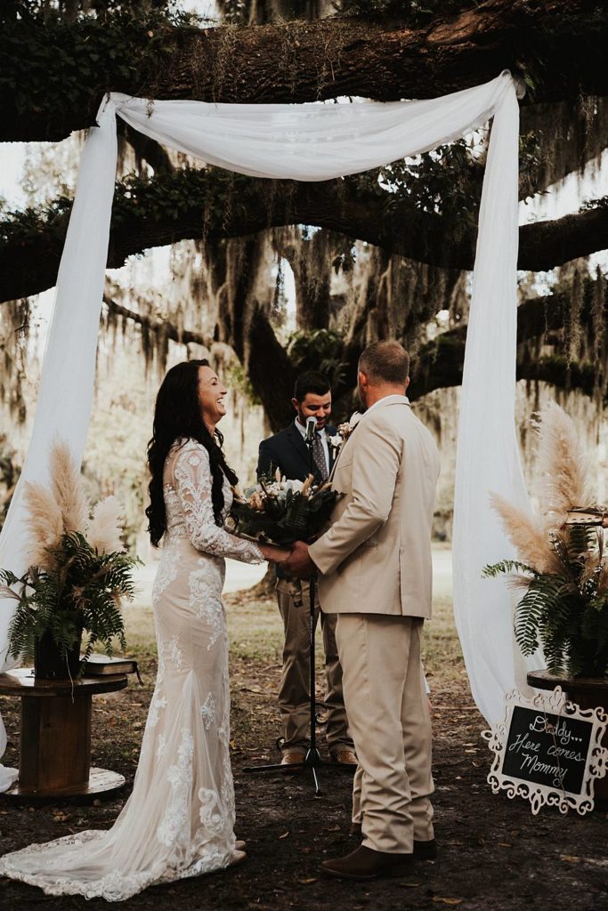 Bride and groom standing at alter at okeechobee wedding ceremony