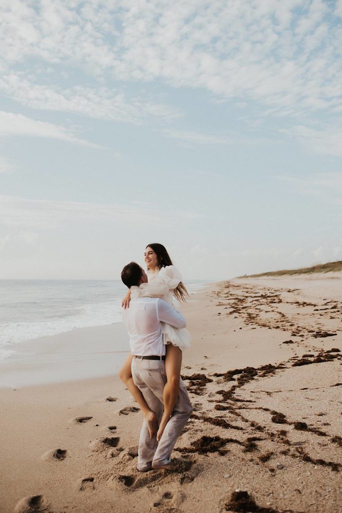 Bride and groom elopement on beach