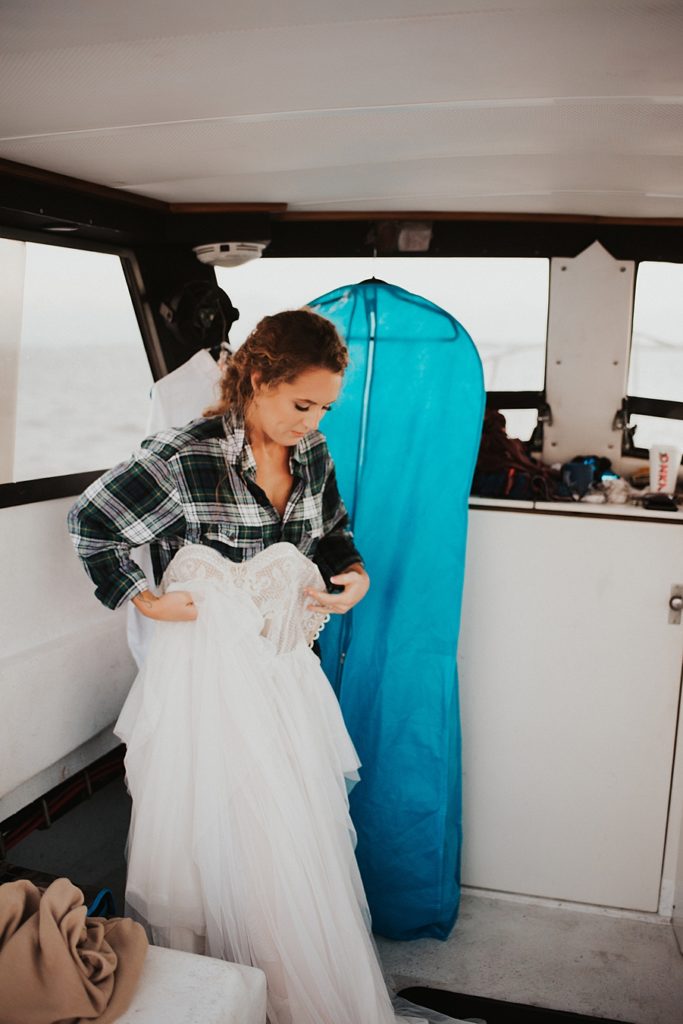 Bride getting ready on boat