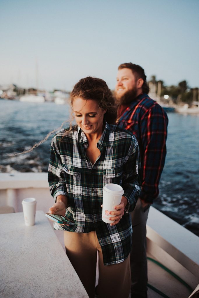Couple in flannel on boat