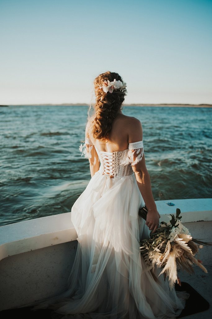 Bride with corset dress and boho braid