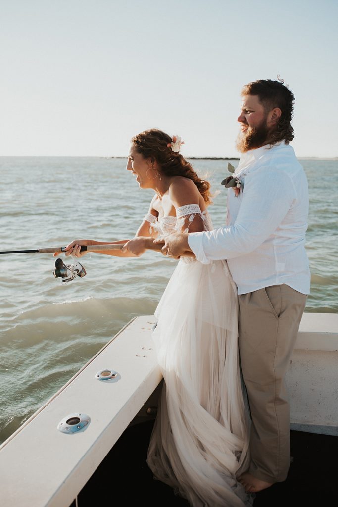 Bride and groom fishing during elopement