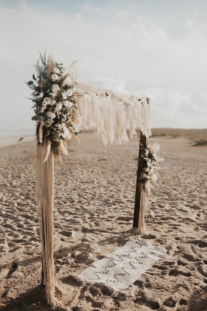Boho wedding arch on the beach