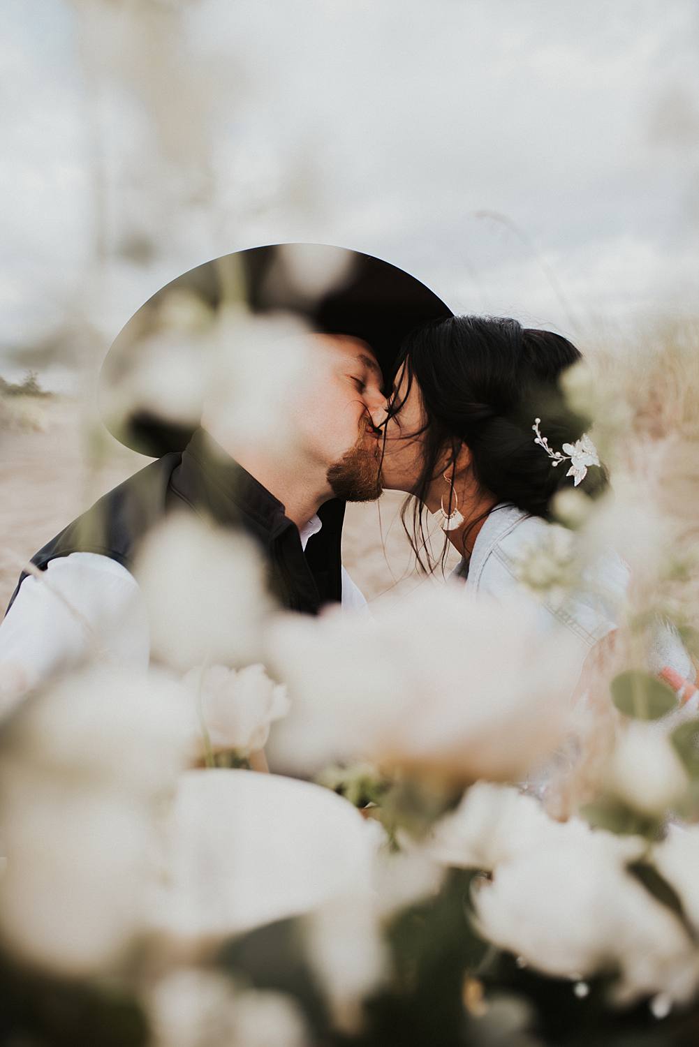 Bride and groom enjoying their luxury picnic on the beach after their Florida elopement