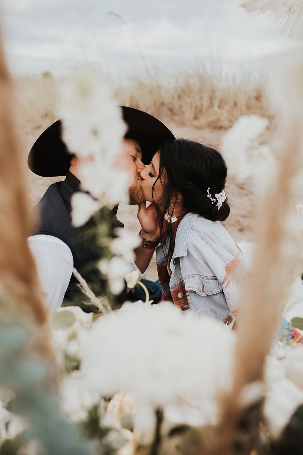 Bride and groom enjoying their luxury picnic on the beach after their Florida elopement