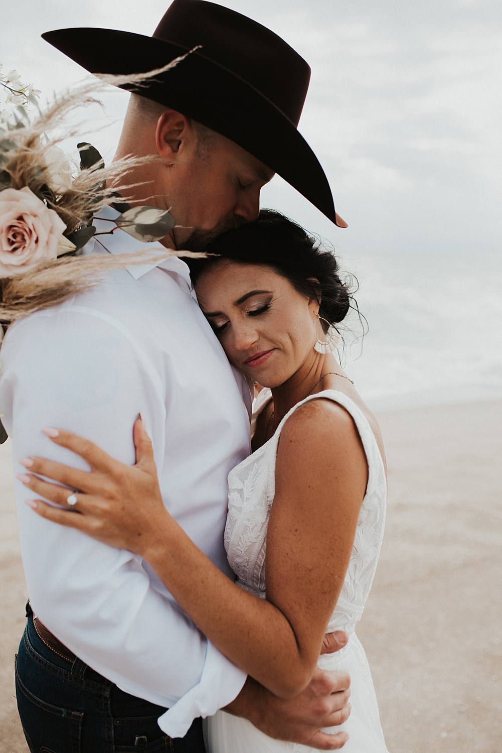 Bride and groom portraits on the beach after their Florida elopement