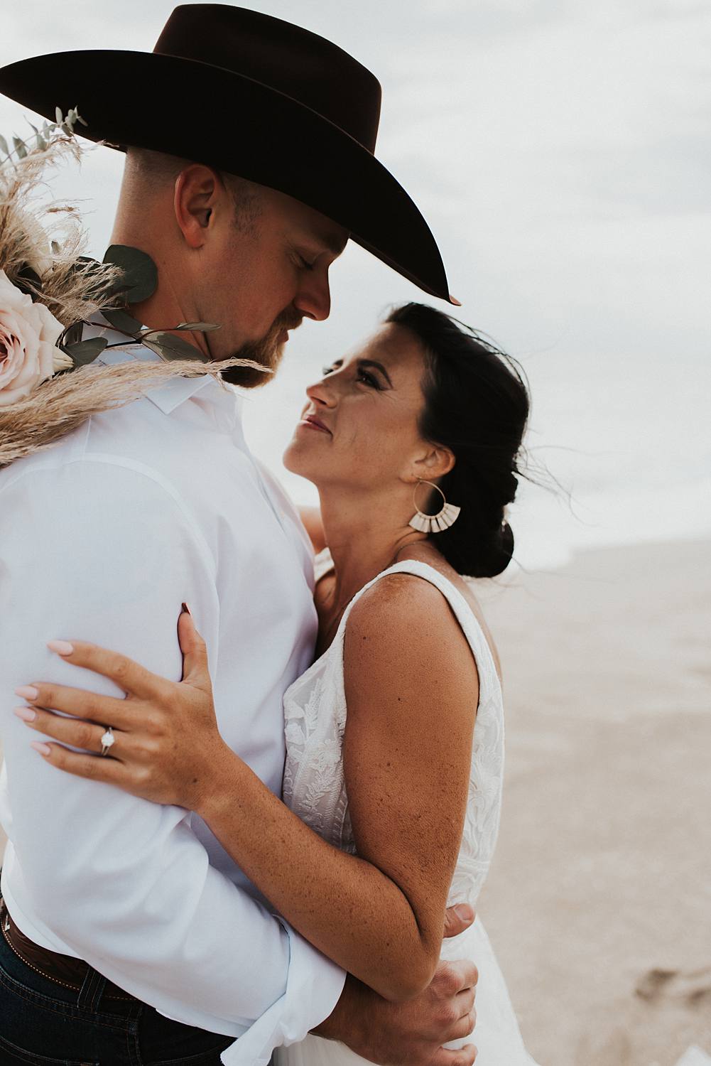 Bride and groom portraits on the beach after their Florida elopement