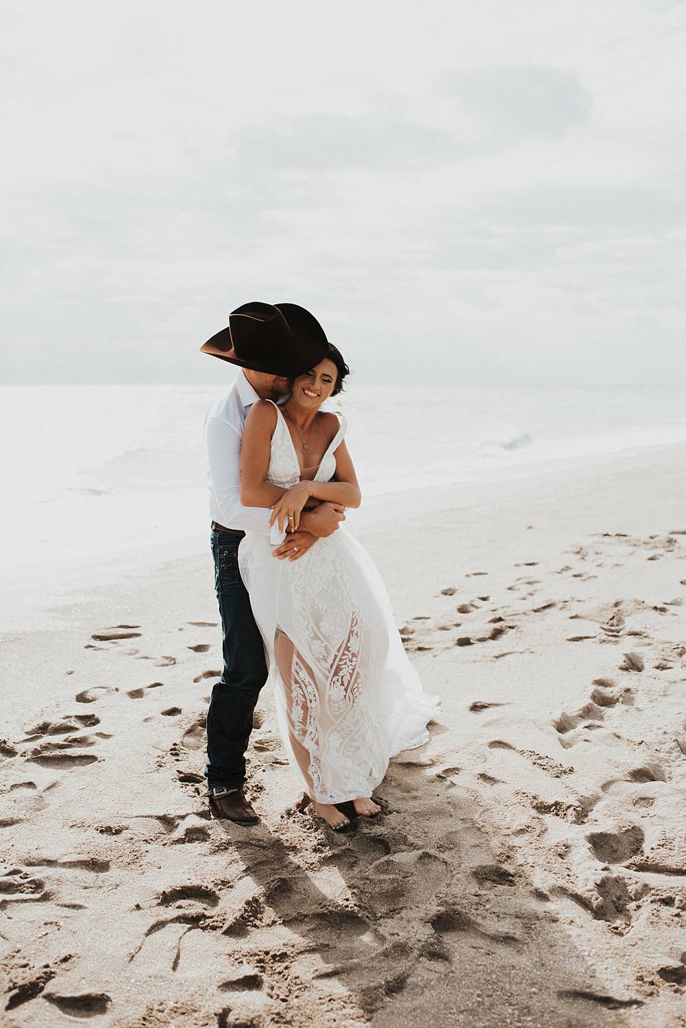 Bride and groom portraits on the beach after their Florida elopement