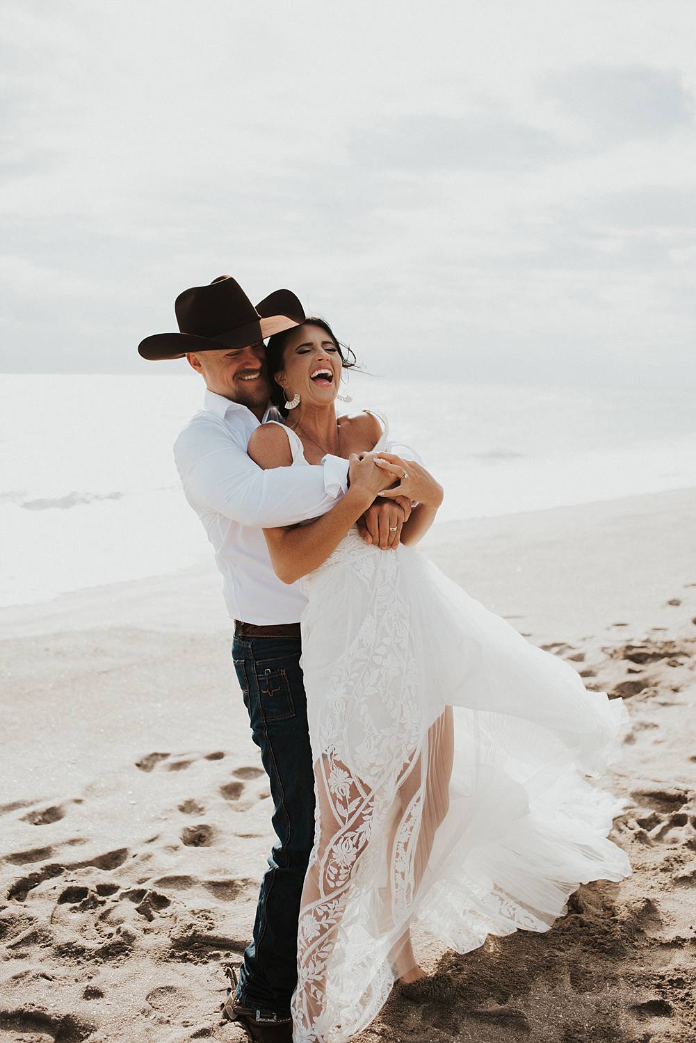 Bride and groom portraits on the beach after their Florida elopement