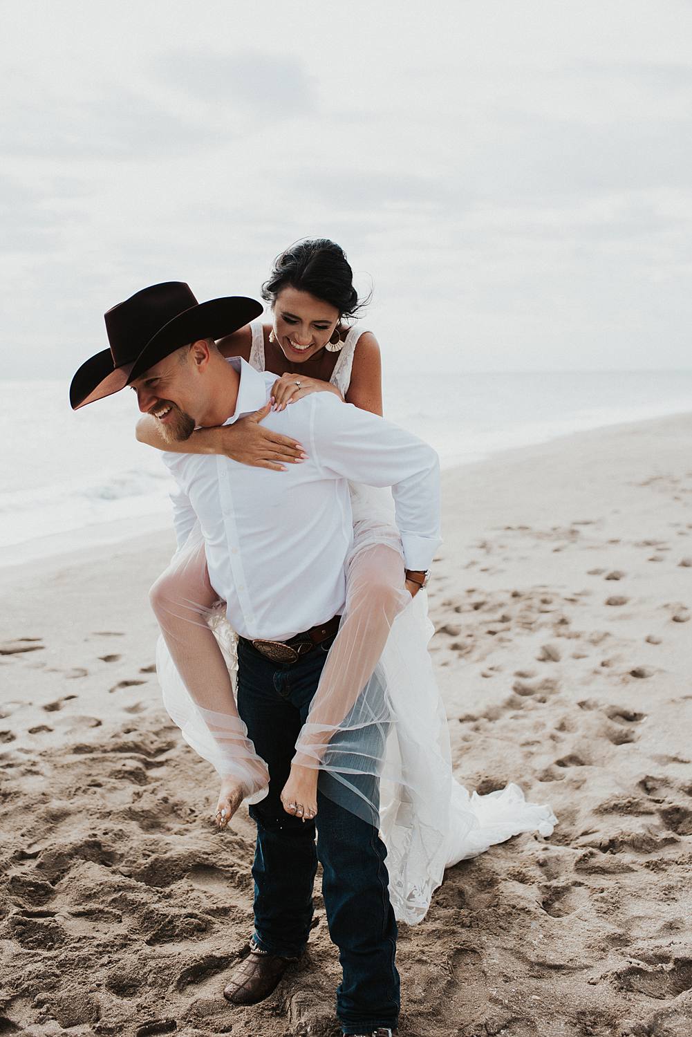 Bride and groom portraits on the beach after their Florida elopement