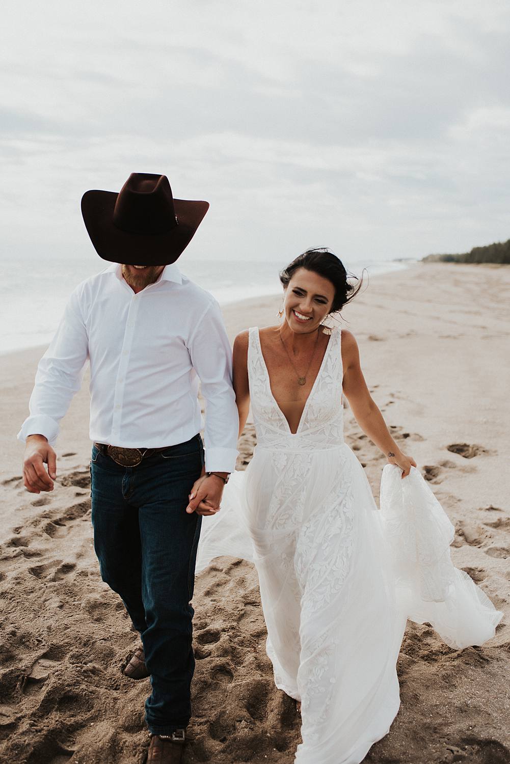 Bride and groom portraits on the beach after their Florida elopement