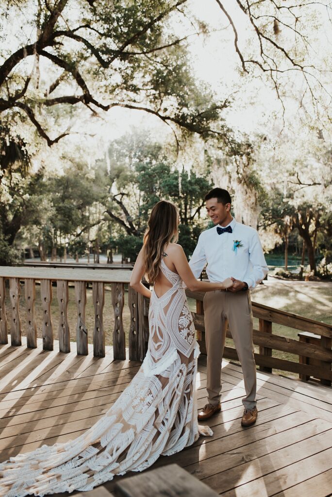 Bride and groom's first look at Kelly Park Rock Spring in Florida