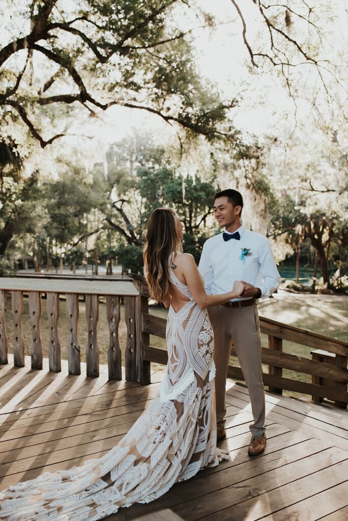 Bride and groom's first look at Kelly Park Rock Spring in Florida