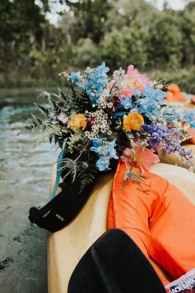 Spring-inspired elopement bouquet in kayak at Kelly Rock Springs