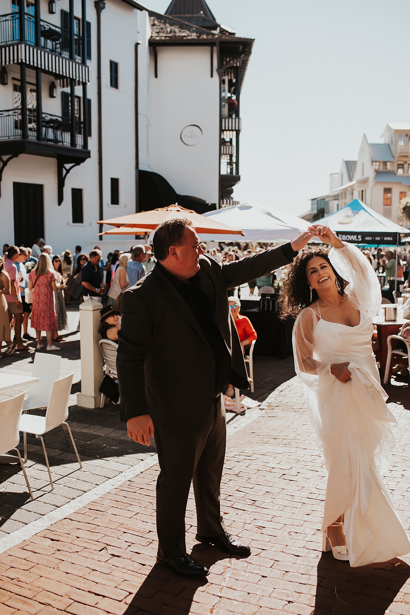 Bride and groom dancing in downtown Rosemary Beach