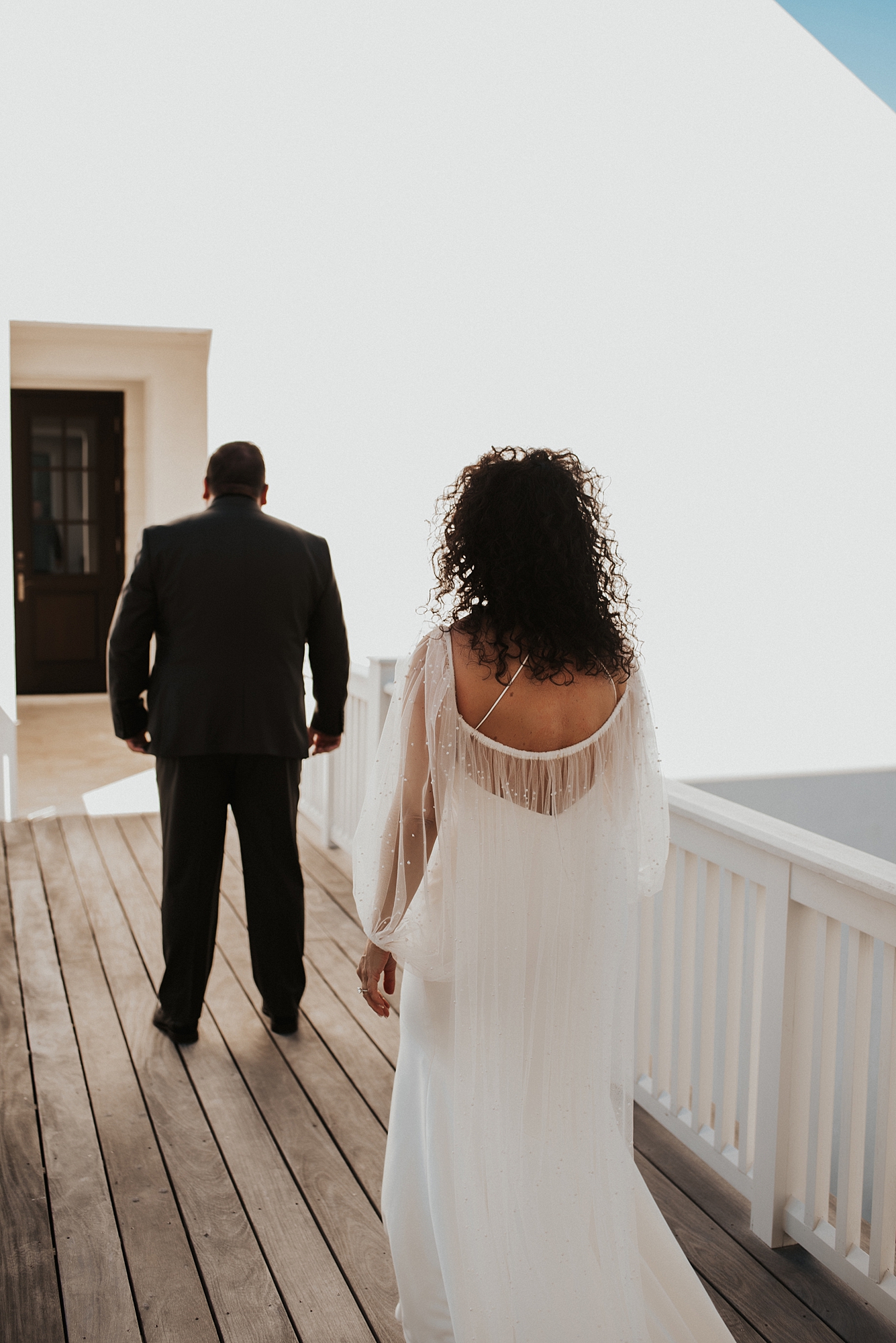 Bride walking towards groom for first look 