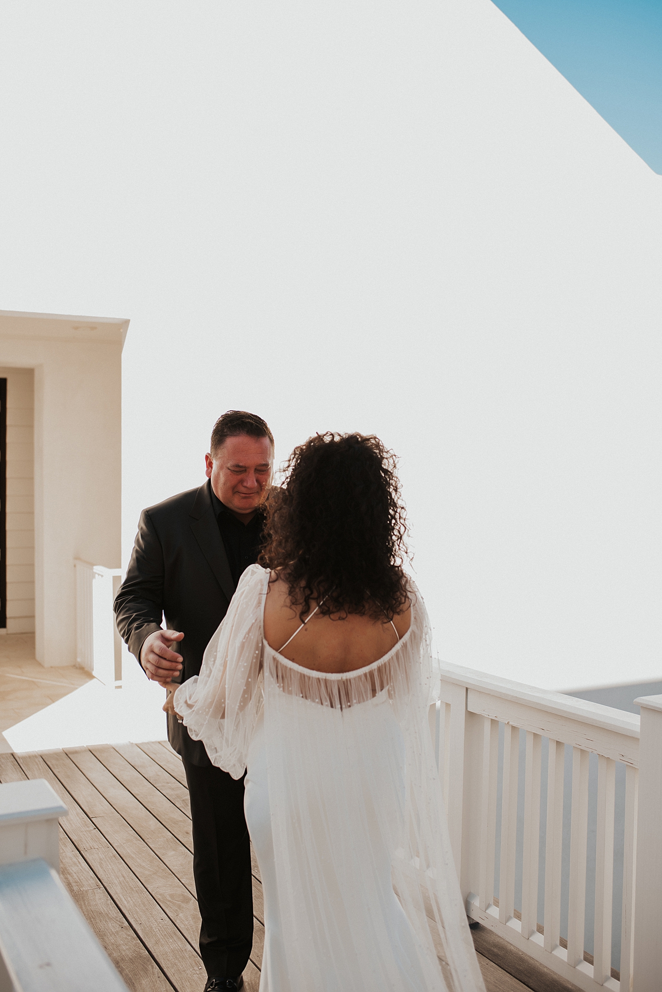 Groom having first look with bride